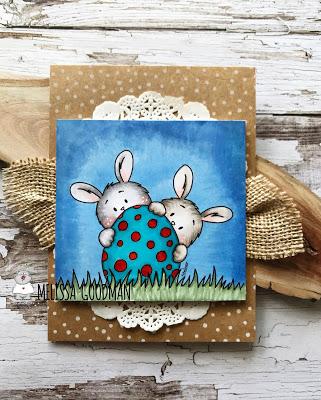 2 Bunnies with an Easter egg